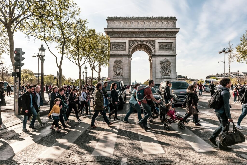 group of people walking on pedestrian lane